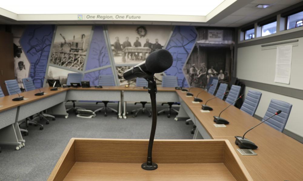 Photo of the podium and microphone in the RDNO board room. 