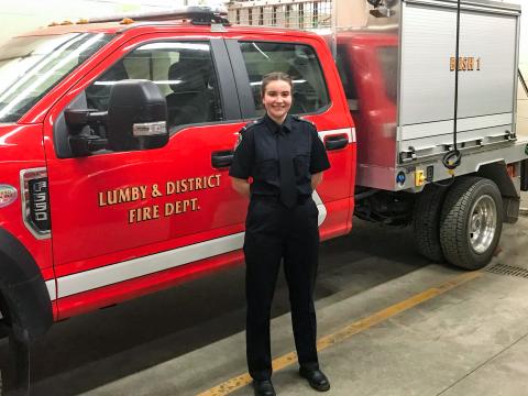 Olive Butler stands in front of the Lumby & District Fire Department’s Wildland/ Urban Interface Response Unit.